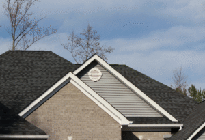 Roof with asphalt shingles and decorative vent, showcasing proper installation techniques relevant to roofing quality and longevity in Germantown, MD.